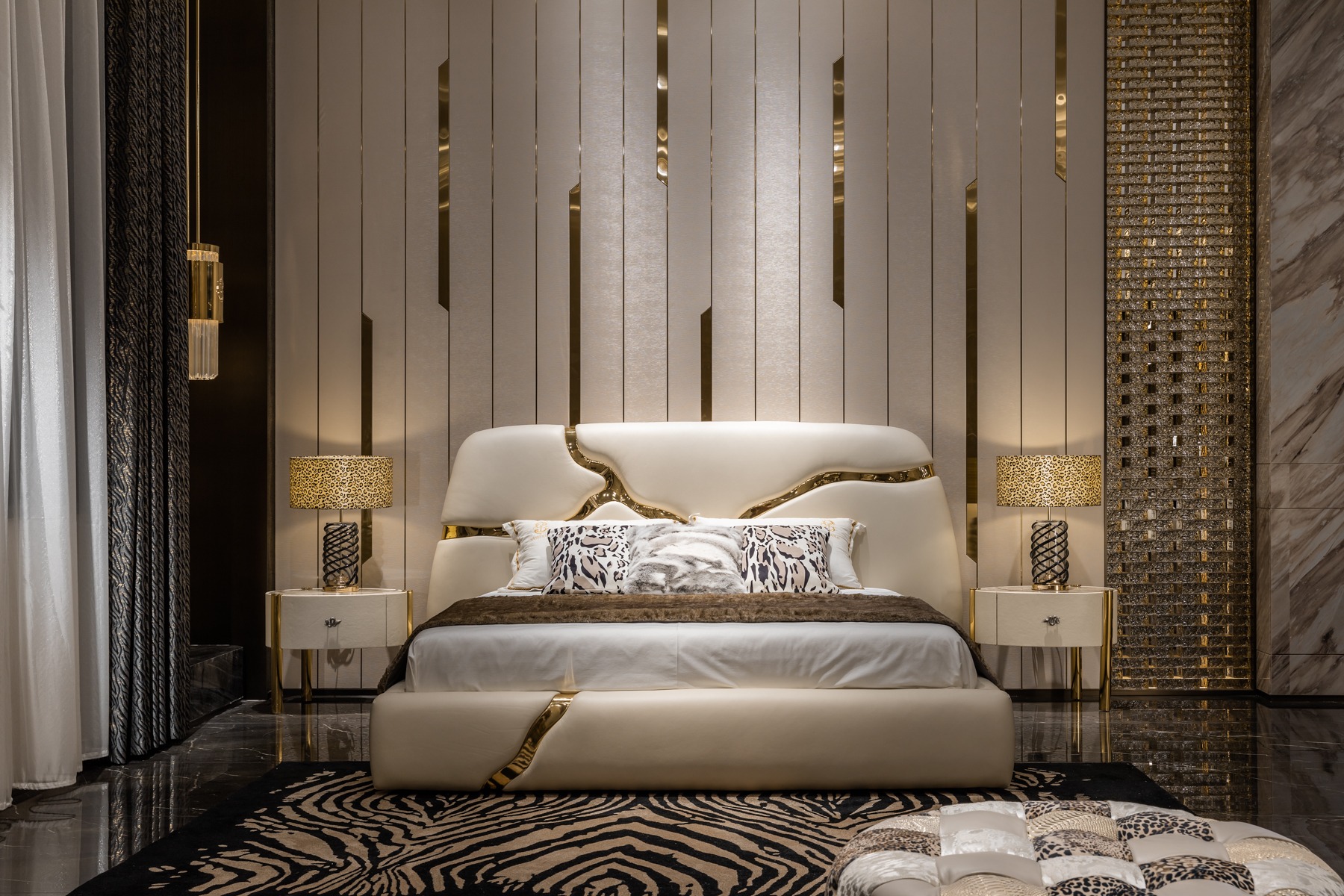Cream upholstered contemporary luxury bed with gold detailing